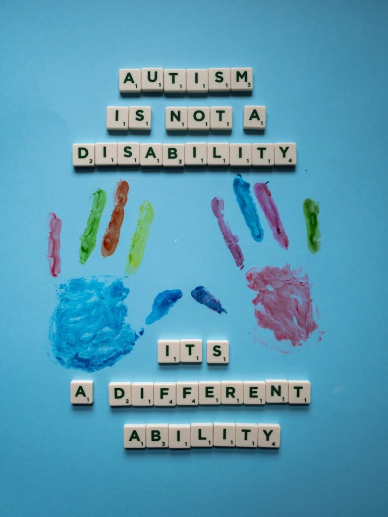 White Scrabble Tiles on Blue Backgroundautism
autism
