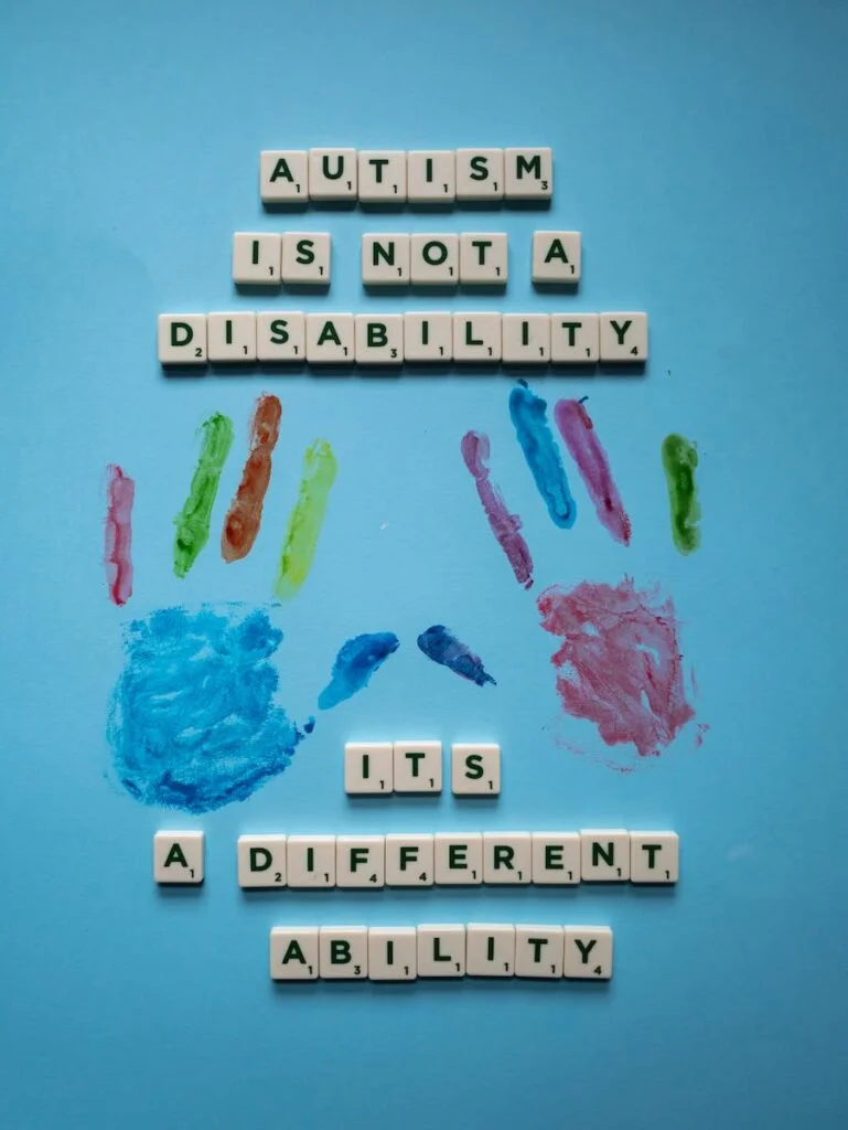White Scrabble Tiles on Blue Backgroundautism
autism